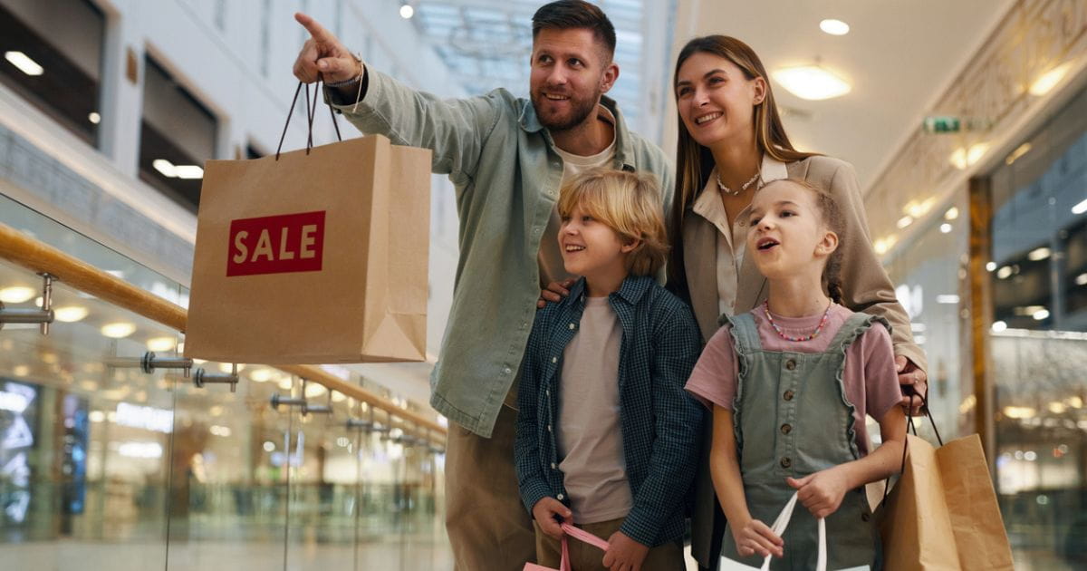 stock image of a family in a shopping centre