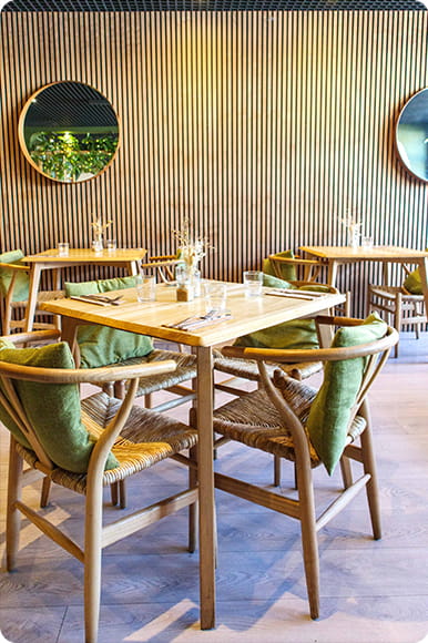 Chairs and tables inside a cafe
