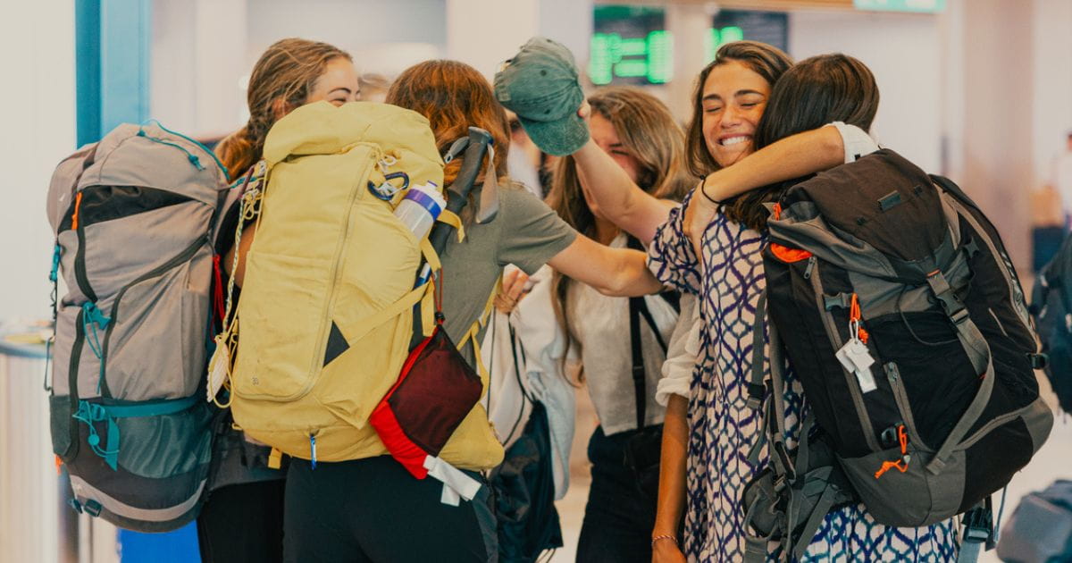 A group of women reunited at the airport