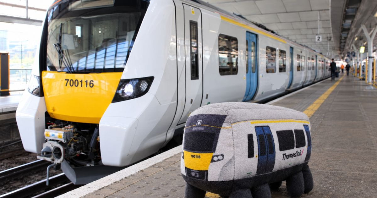 Thameslink plushie on platform with Class 700 train