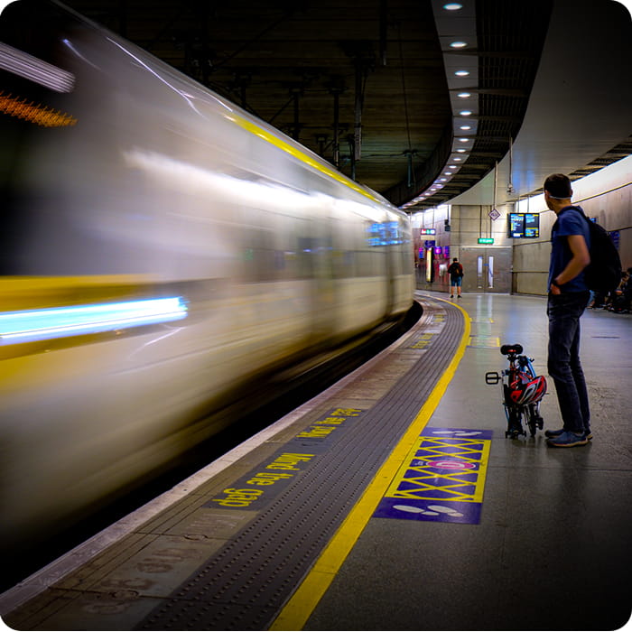 Train travelling through a station